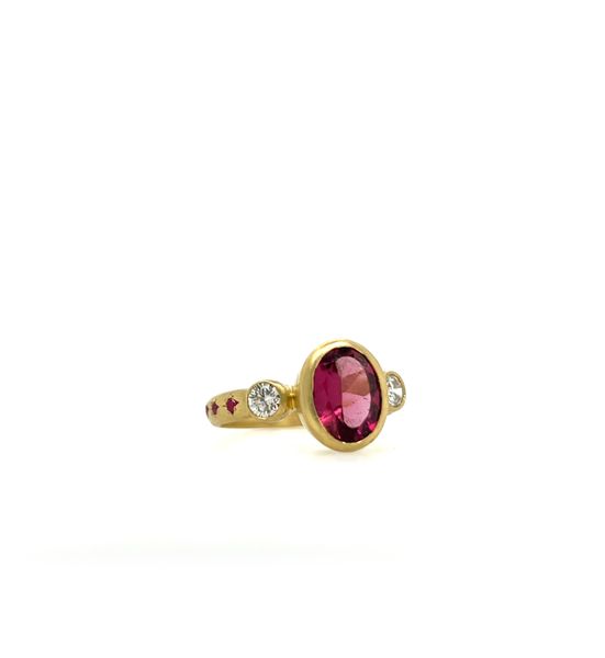 Three-Stone Ring with Rubellite Tourmaline, Champagne Diamonds, and Pink Sapphires